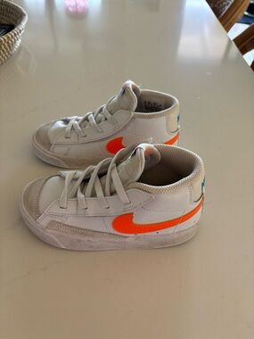 Nike Kids Blazer White High-Top Sneakers with Bright Orange Swoosh